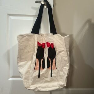 Stylish Cream Tote Bag with Red Accents